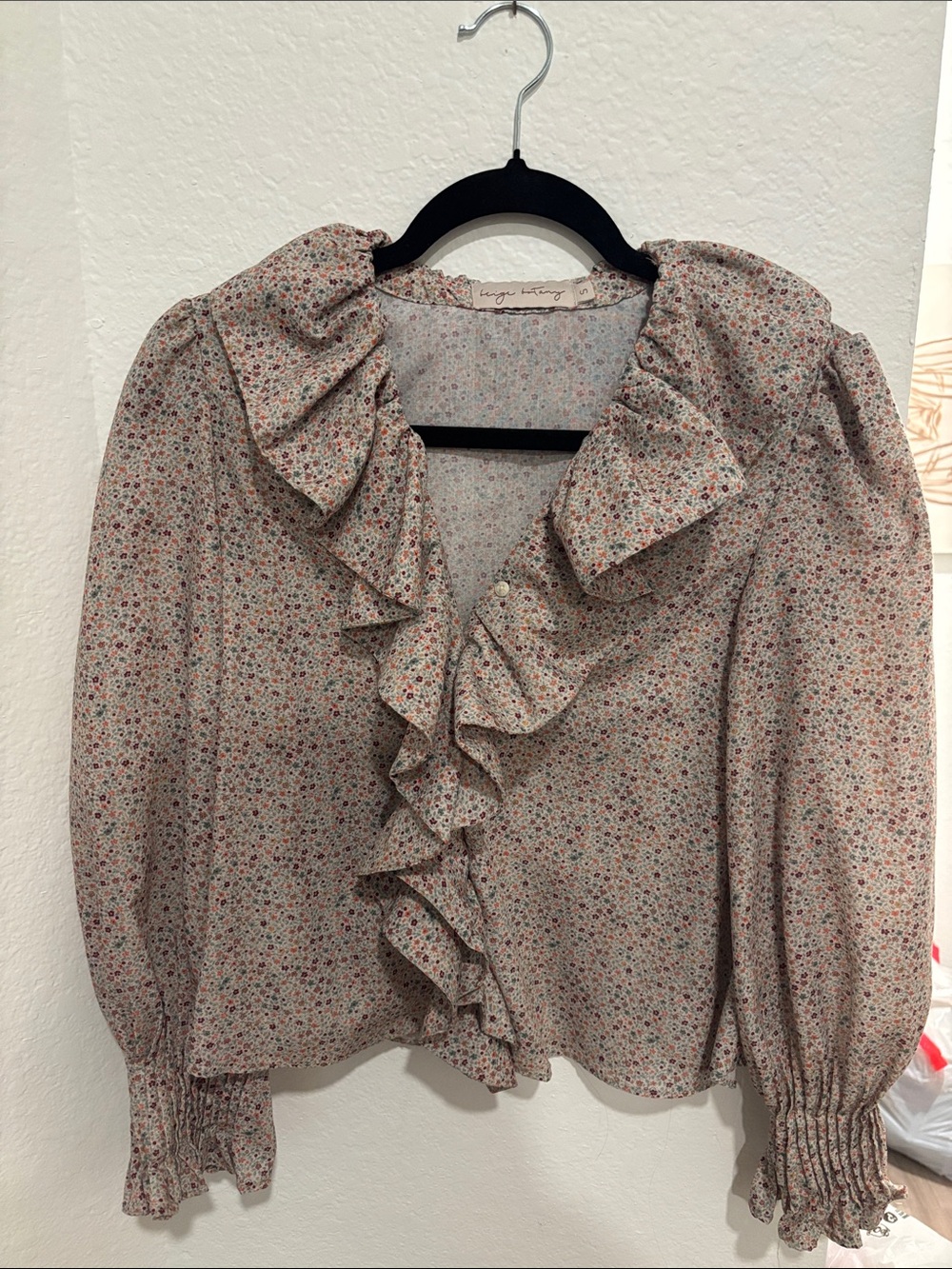 Beige botany ruffle floral blouse